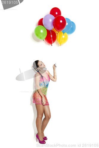 Image of Fashion woman with ballons