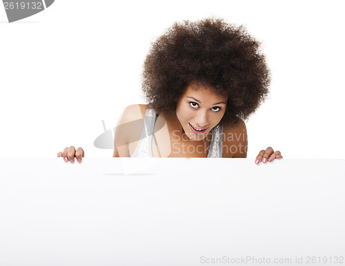 Image of Woman holding a white billboard