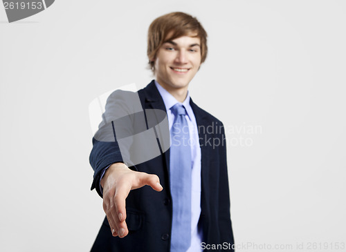 Image of Businessman giving a handshake