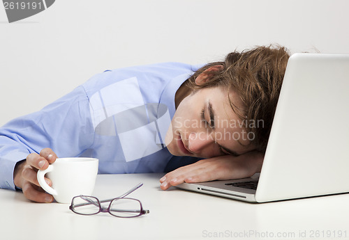 Image of Sleeping over the laptop