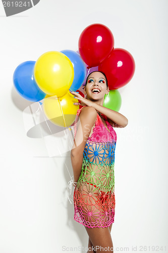 Image of Fashion woman with ballons