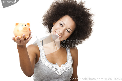 Image of Woman with a piggy bank