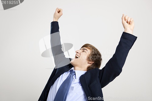 Image of Businessman with arms up