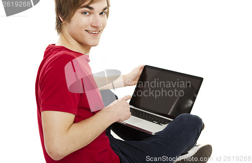 Image of Man working with a laptop