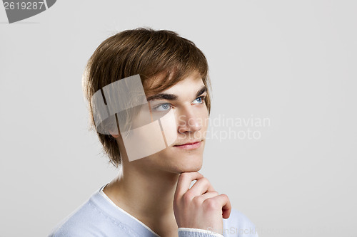Image of Young man thinking