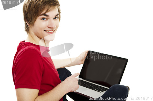 Image of Man working with a laptop