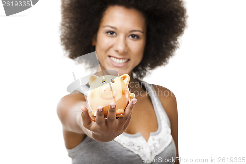 Image of Woman with a piggy bank