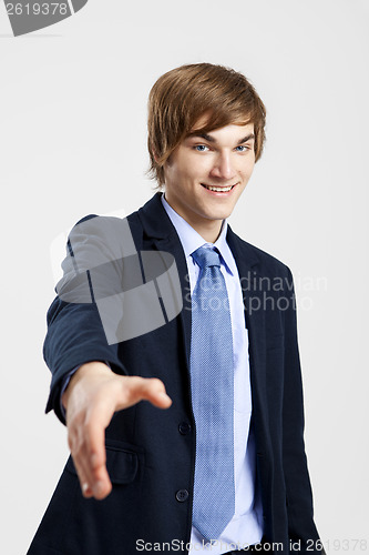 Image of Businessman giving a handshake