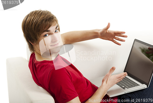 Image of Young man with a laptop