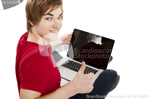 Image of Man working with a laptop