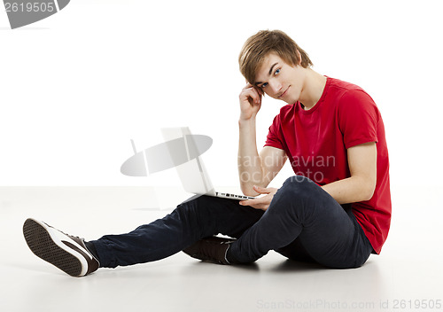 Image of Man working with a laptop