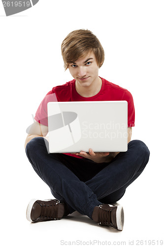 Image of Man working with a laptop