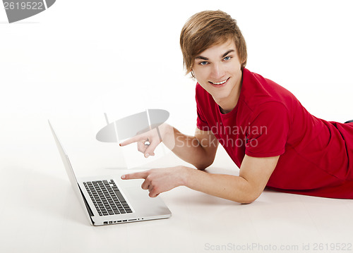 Image of Man working with a laptop