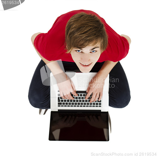 Image of Man working with a laptop