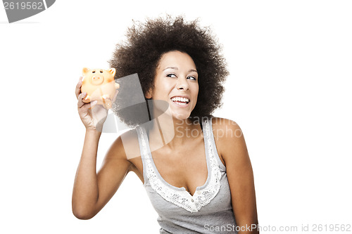 Image of Woman with a piggy bank