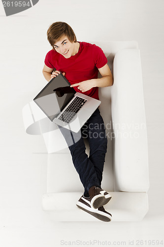 Image of Young man with a laptop