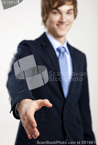 Image of Businessman giving a handshake