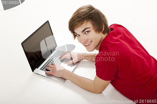 Image of Man working with a laptop