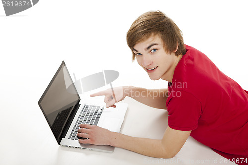 Image of Man working with a laptop