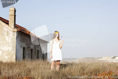 Image of Woman in a white dress