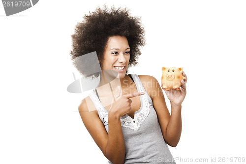 Image of Woman with a piggy bank