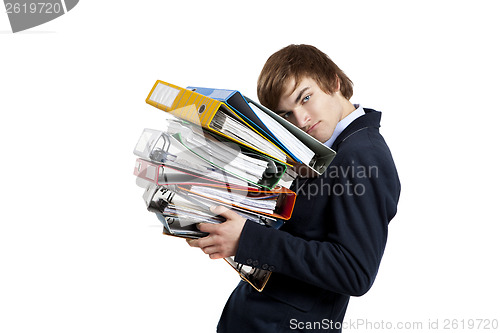 Image of Business man carrying folders