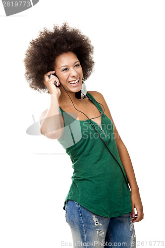 Image of Happy woman listen music