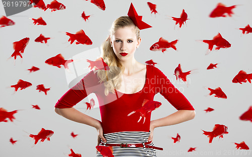 Image of Fashion woman with red fishes