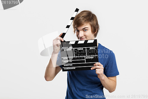 Image of Holding a clapboard