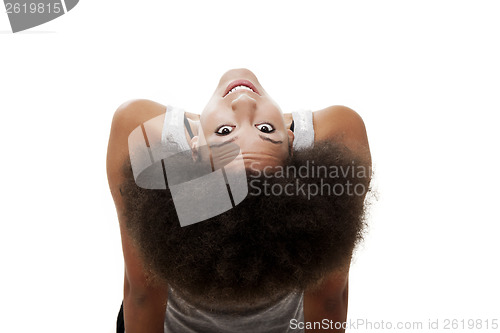 Image of woman sitting and looking back