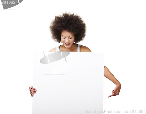 Image of Woman holding a white billboard