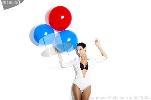Image of Fashion woman with ballons