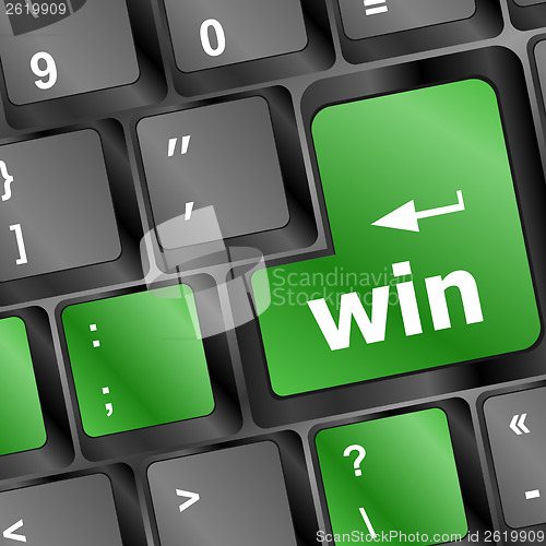 Image of win word on computer keyboard key button
