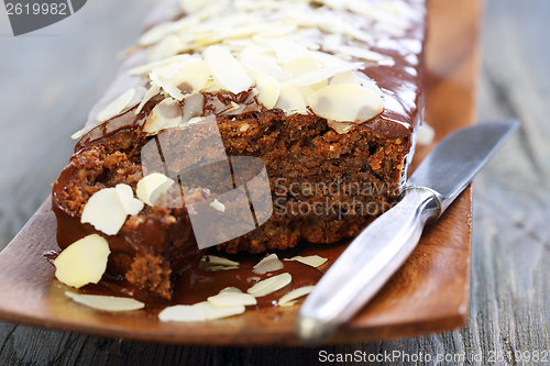 Image of Franzhipan with chocolate and almond petals. 