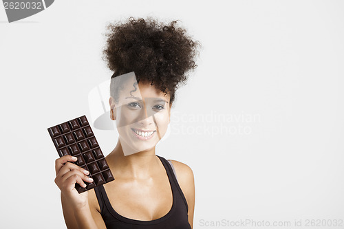 Image of Woman with a chocolate bar
