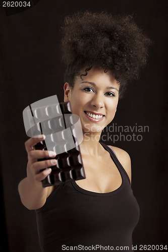 Image of Woman with a chocolate bar