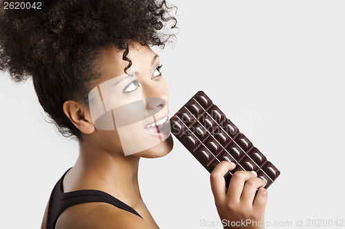 Image of Woman eating chcolate