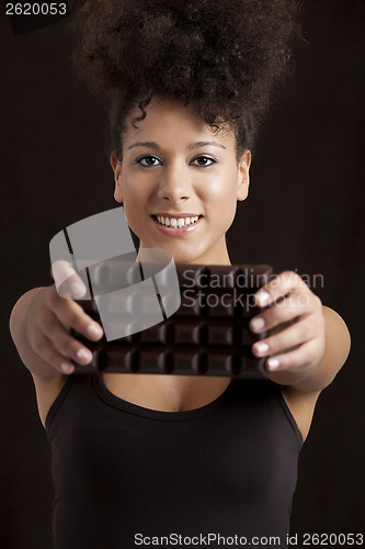 Image of Woman with a chocolate bar