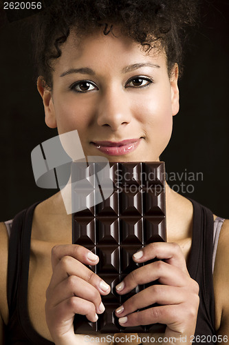 Image of Woman with a chocolate bar