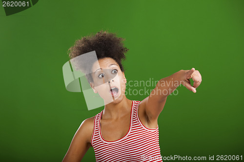 Image of African woman pointing somewhere