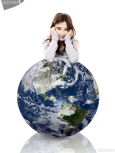 Image of Girl over the planet earth