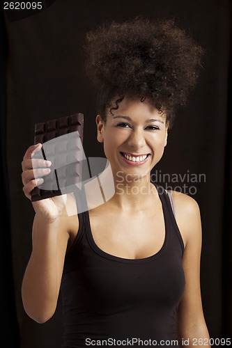 Image of Woman with a chocolate bar