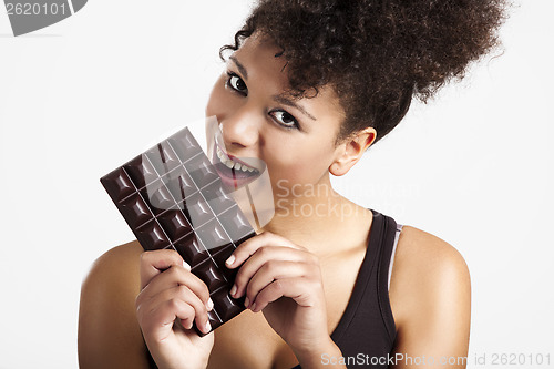 Image of Woman eating chcolate