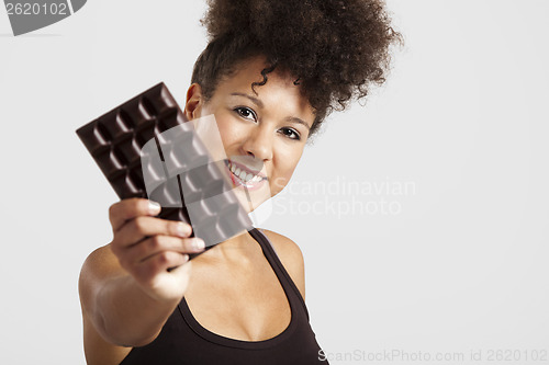 Image of Woman with a chocolate bar