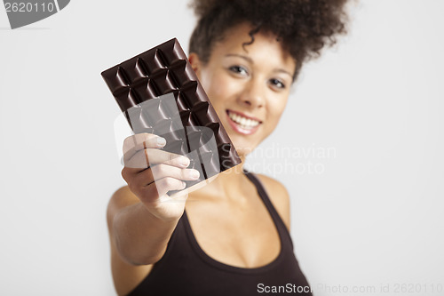 Image of Woman with a chocolate bar