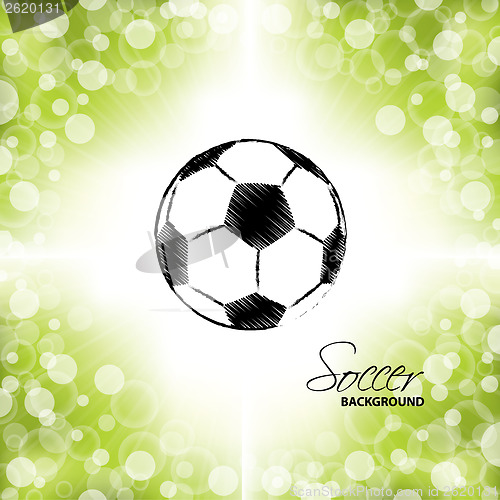 Image of Soccer ball on green and white background