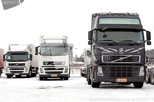 Image of Group of Volvo Trucks in Winter Conditions