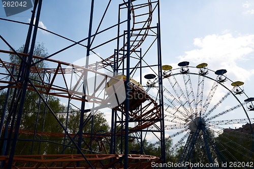 Image of "Russian hills" amusement ride and ferris wheel