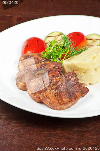 Image of tongue with grilled vegetable