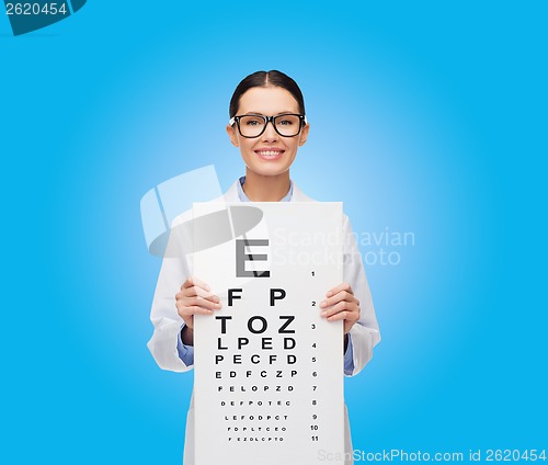 Image of female doctor in eyeglasses with eue chart